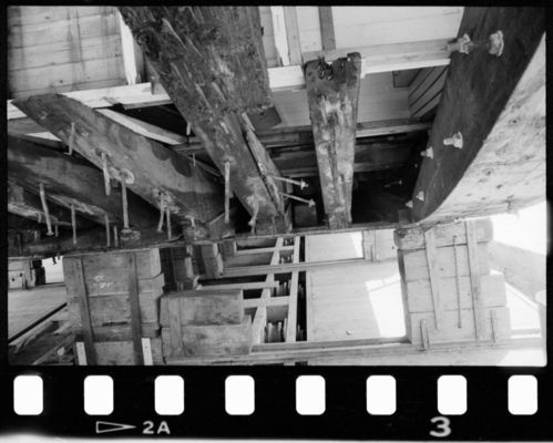 Various views of Alma (built 1891; scow schooner) in drydock, 1987