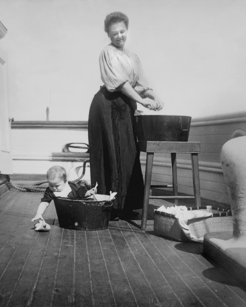 Agnes Tapley, wife of Captain Tapley, and their daughter onboard the sailing ship St. James in 1898. J9.24,359.66n