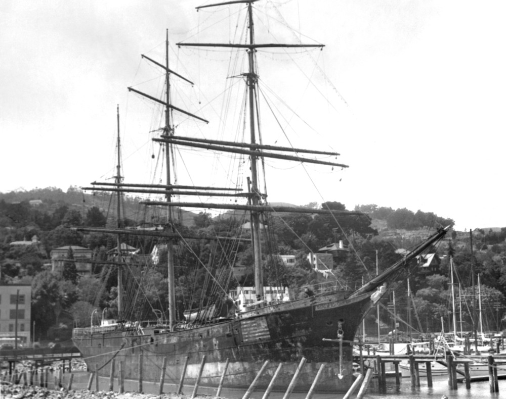 Balclutha in October, 1952, then known as the Pacific Queen,deteriorating on a mudflat in Sausalito, CA. P82-019A.2251n
