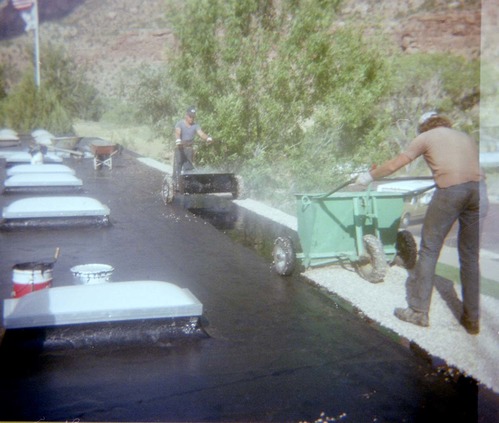Man operating roofing machine during the headquarters/visitor center roofing project.