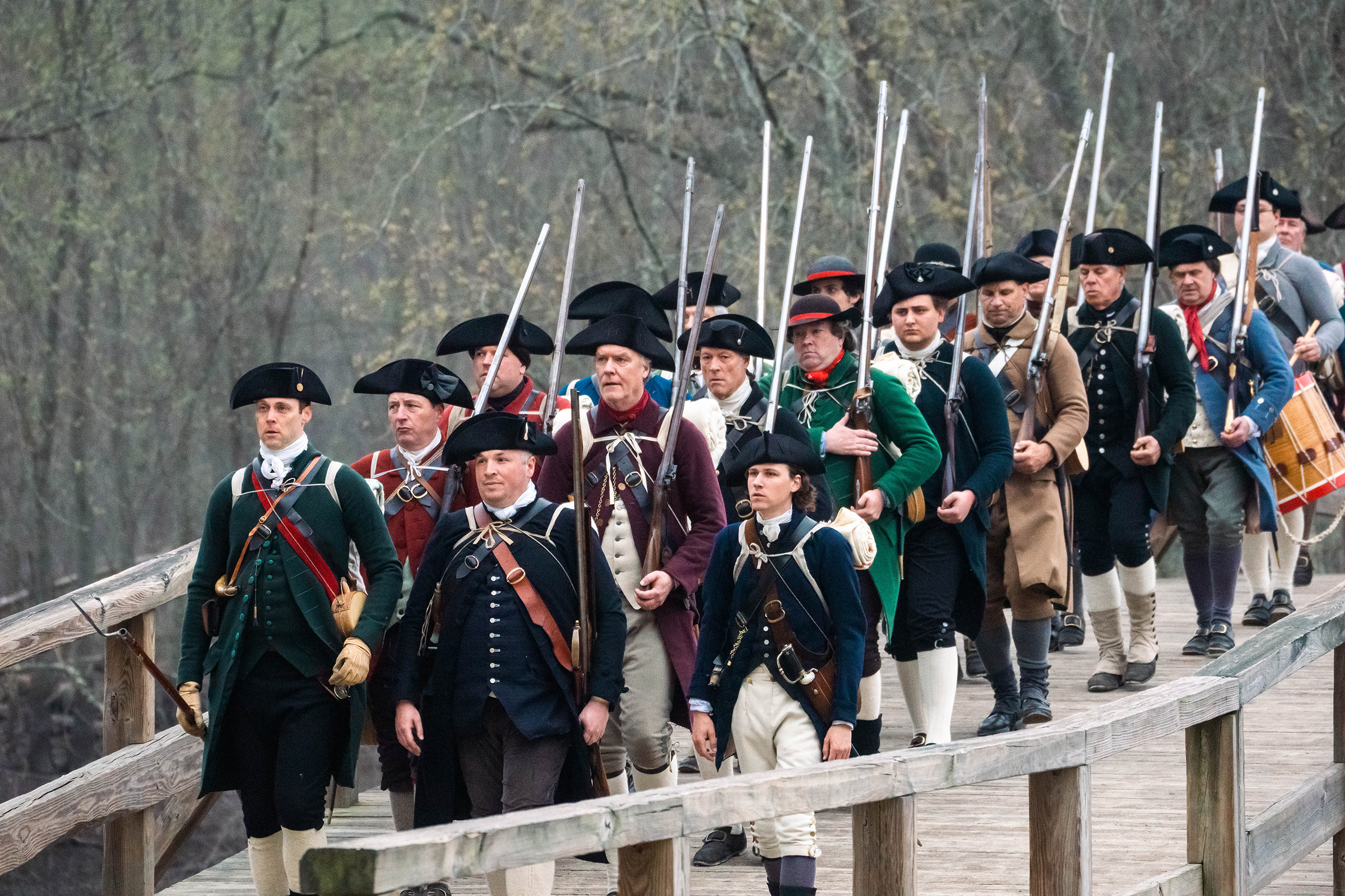 Large company of minute men marching over the North Bridge