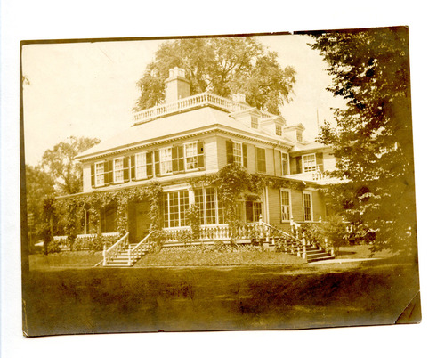 Photograph of side of Georgian mansion.