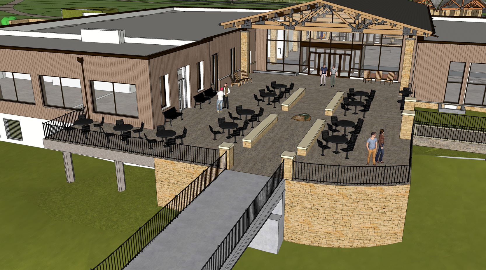 A computerized illustration of a large flat gathering area with tables, chairs edged in a black metal railing behind a large building. 