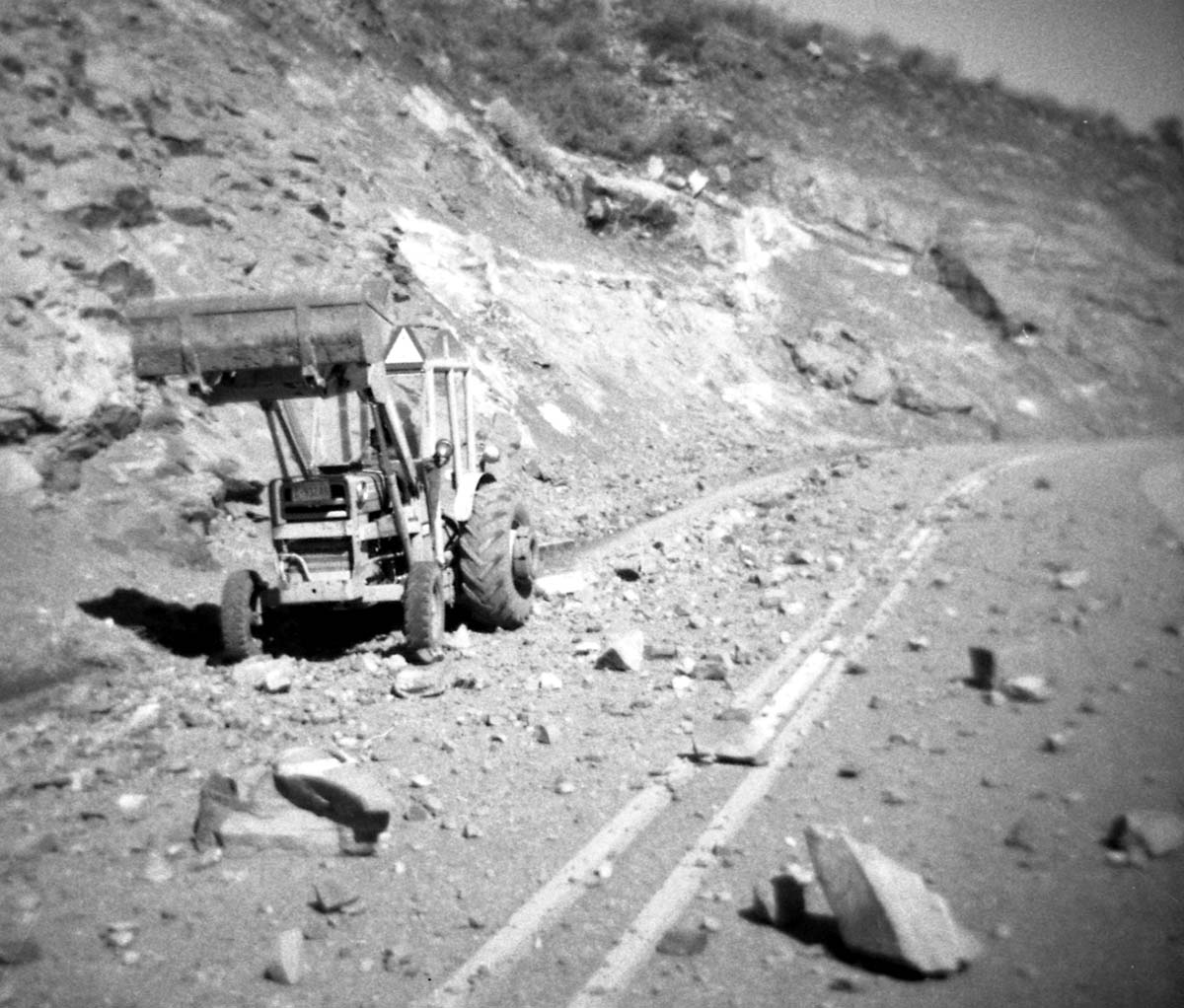 BW photos of rock slides in Kolob Canyons - 110mm. Backhoe clearing debris off roadway.