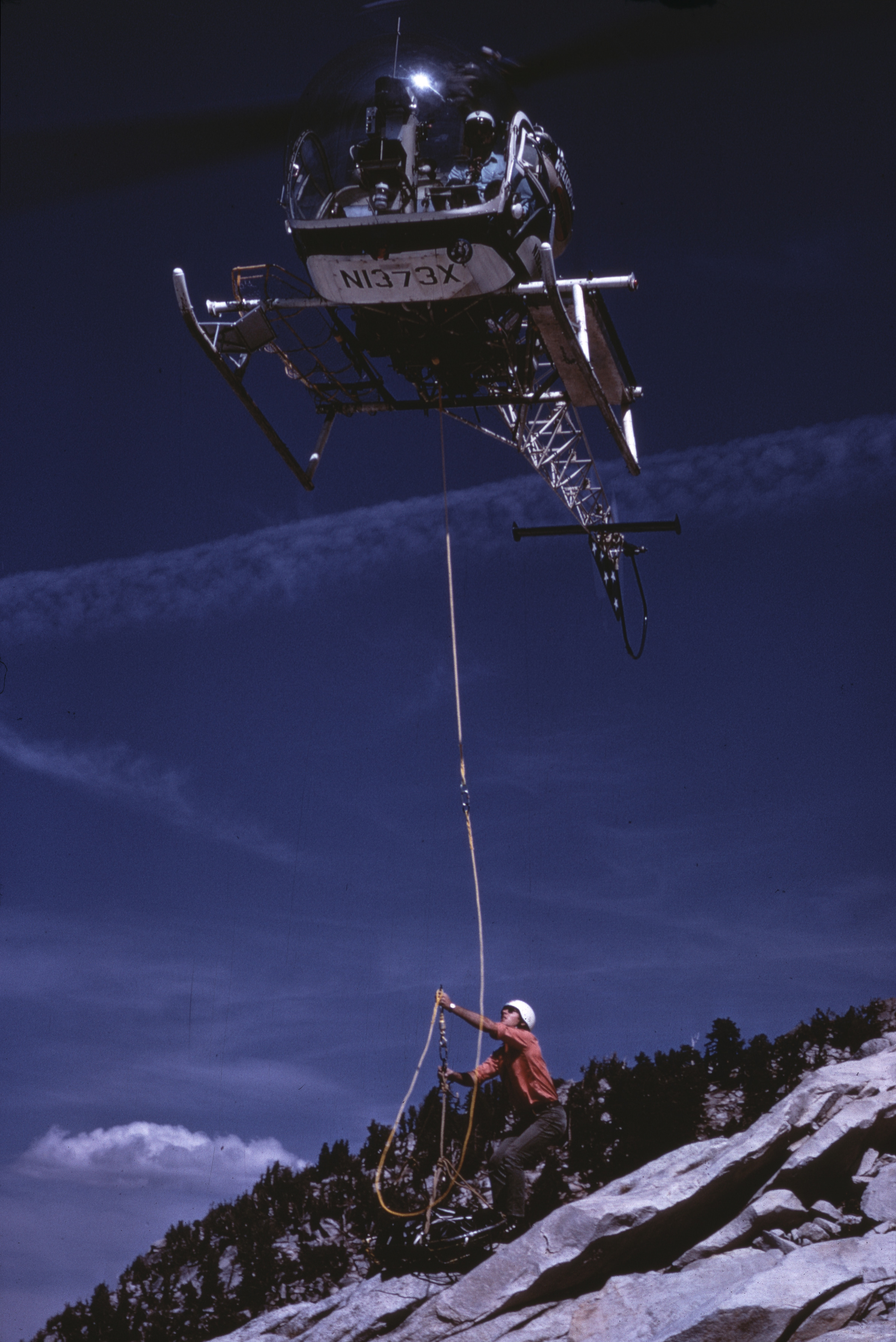 SAR helicopter lifting rescue litter