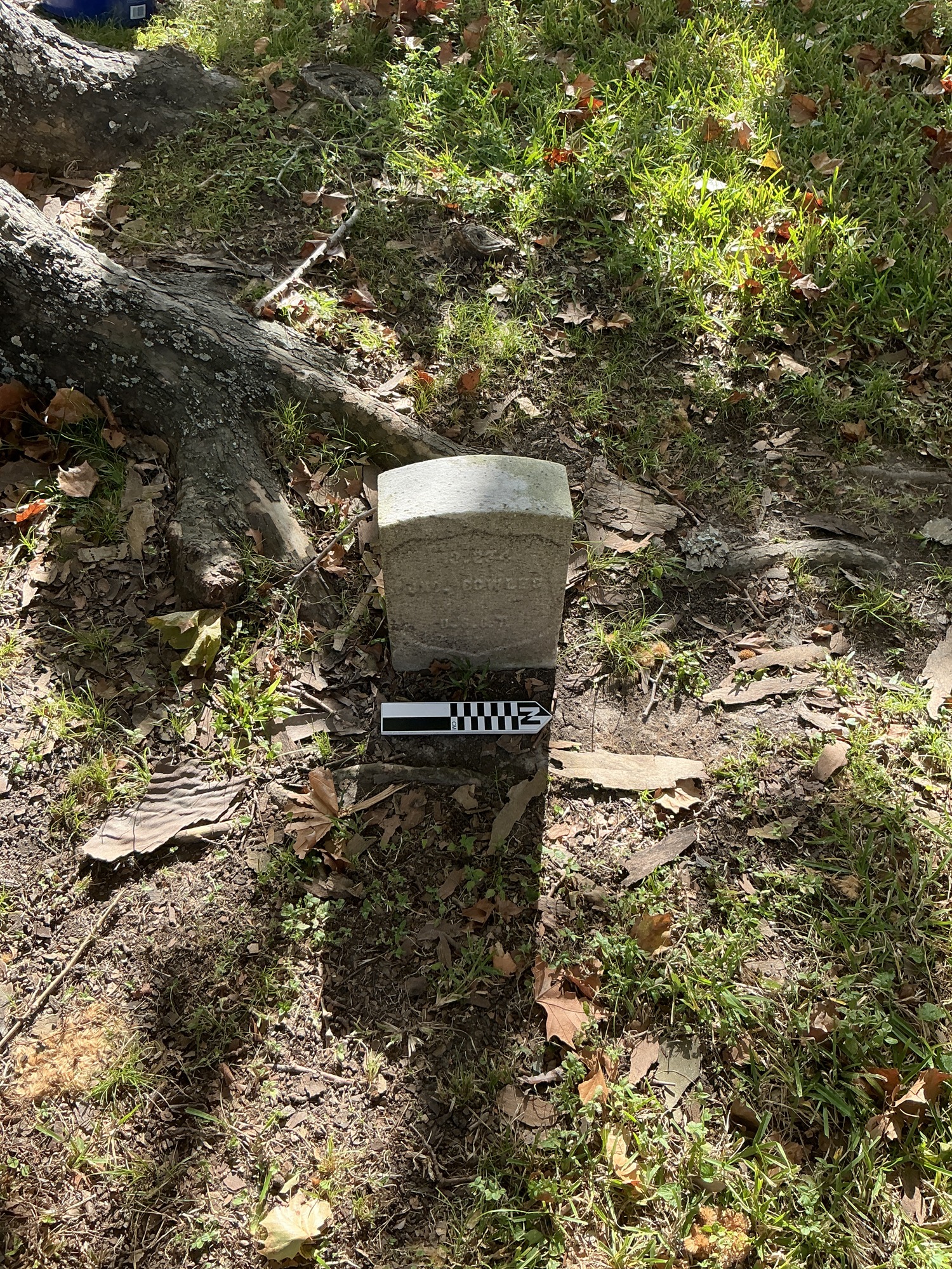 Extra image of historic upright marble headstone with recessed shield face.
