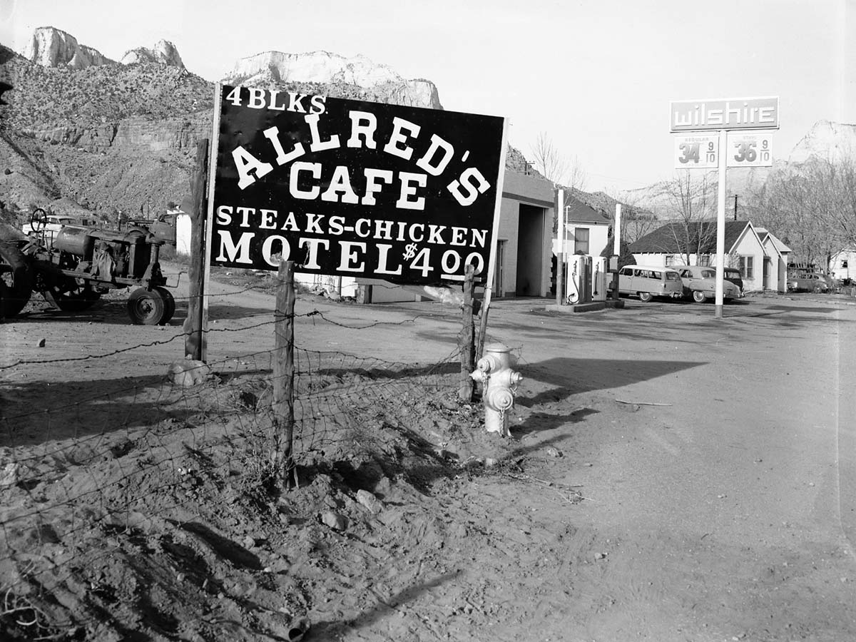 Roadside signs in Springdale. Allred's Cafe. Proposed clean-up of approach to Zion National Park.