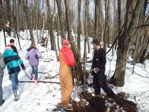 SLBE Benzie Central Earth Day 2011 Students Removing Fence from Woods