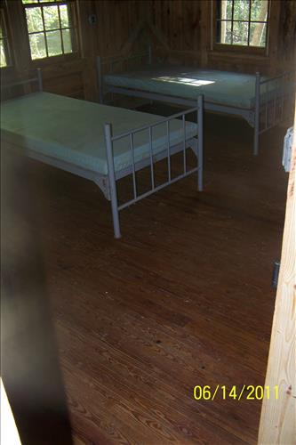 Rehabilitate historic cabin building 65 in camp Mawavi (Camp 2) at Prince William Forest Park in July 2011