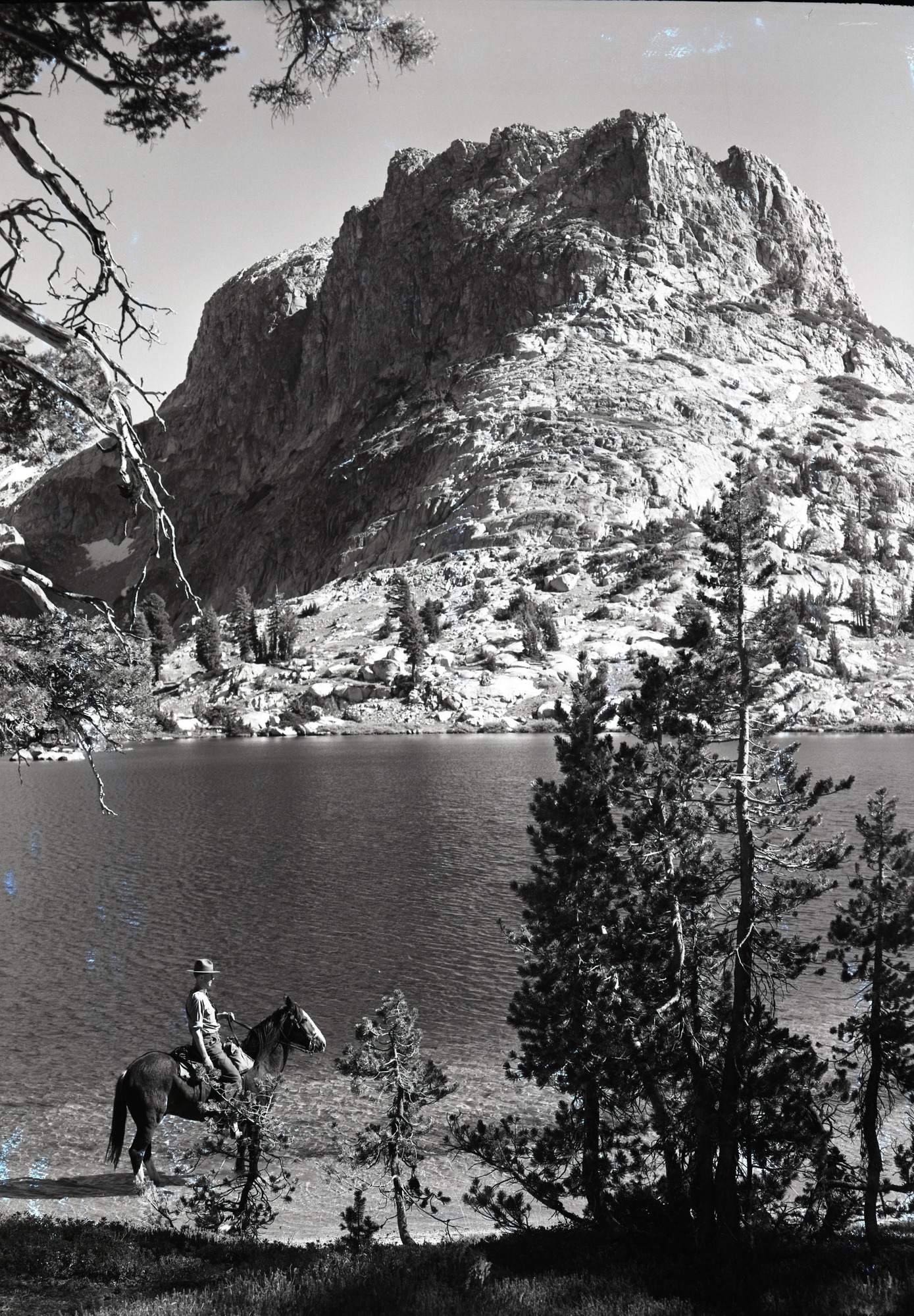 Art Holmes on horseback.