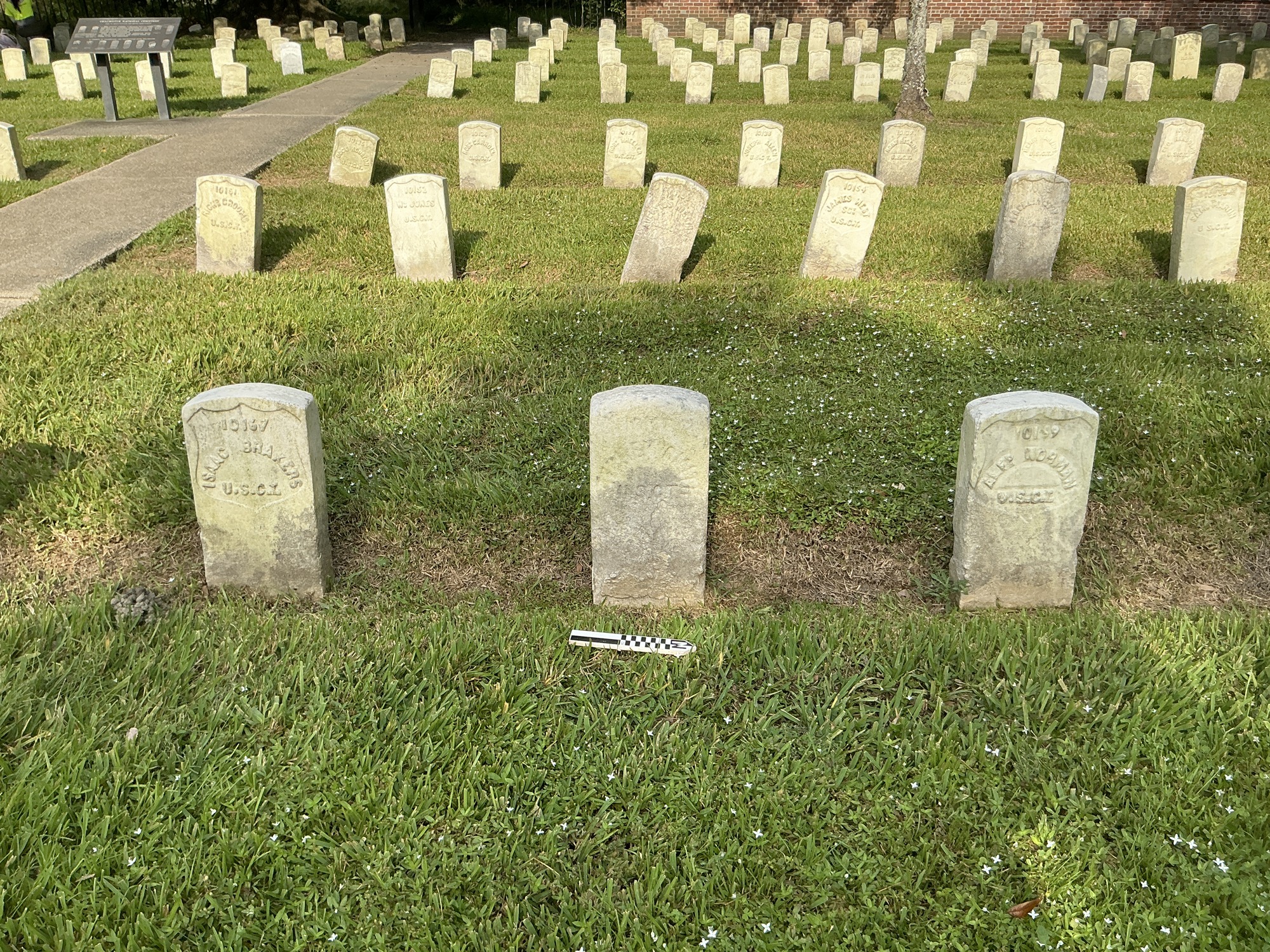 Extra image of historic upright marble headstone with flat face.