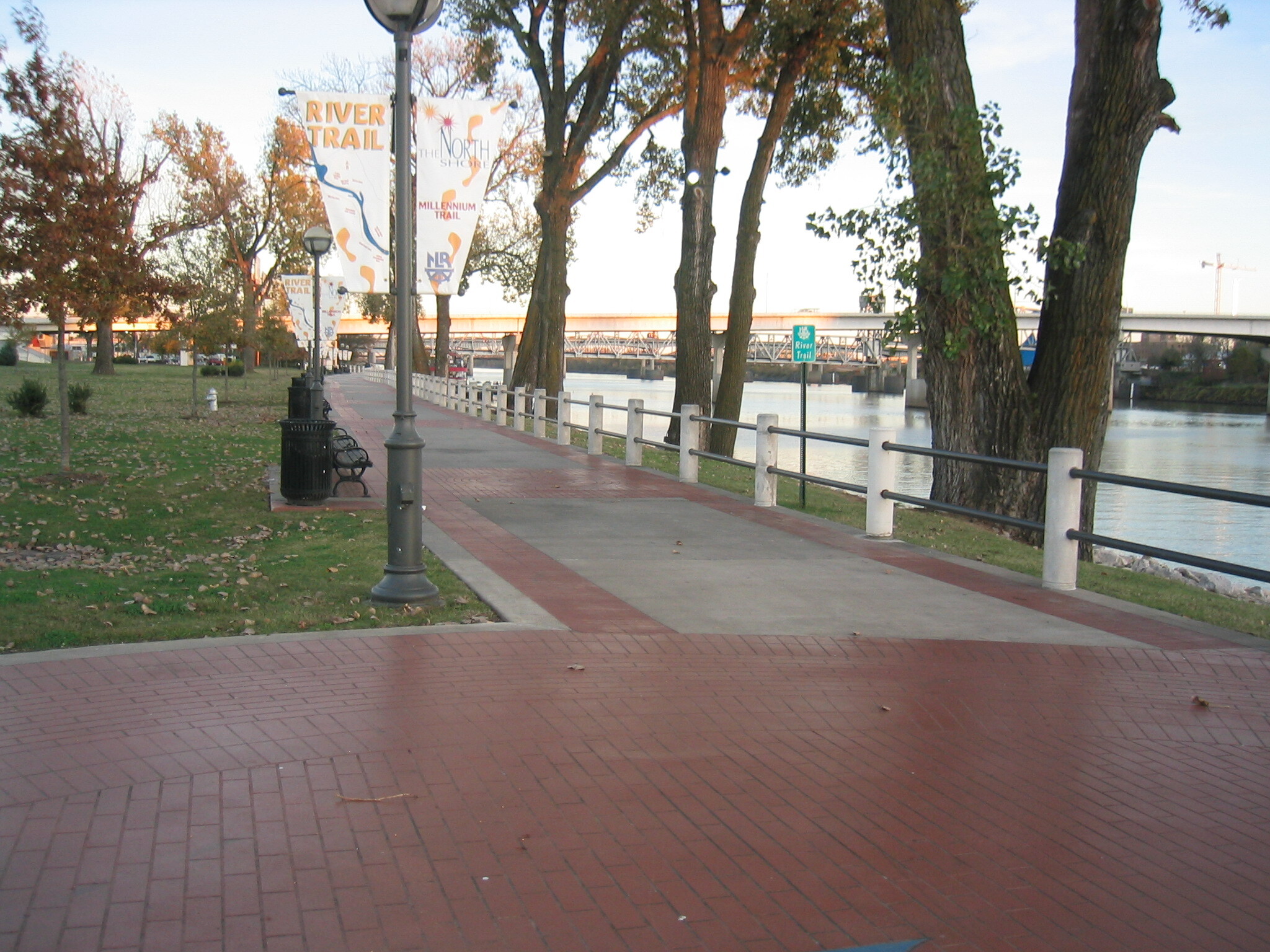 A tree-lined recreational trail along the Arkansas River in North Little Rock, Arkansas