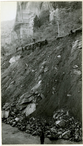 Workers engaged in bank stabilization above the Zion Mt Carmel Highway.