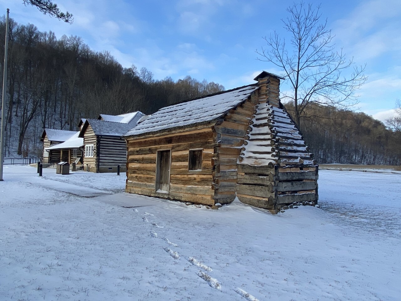 log cabin in the snow