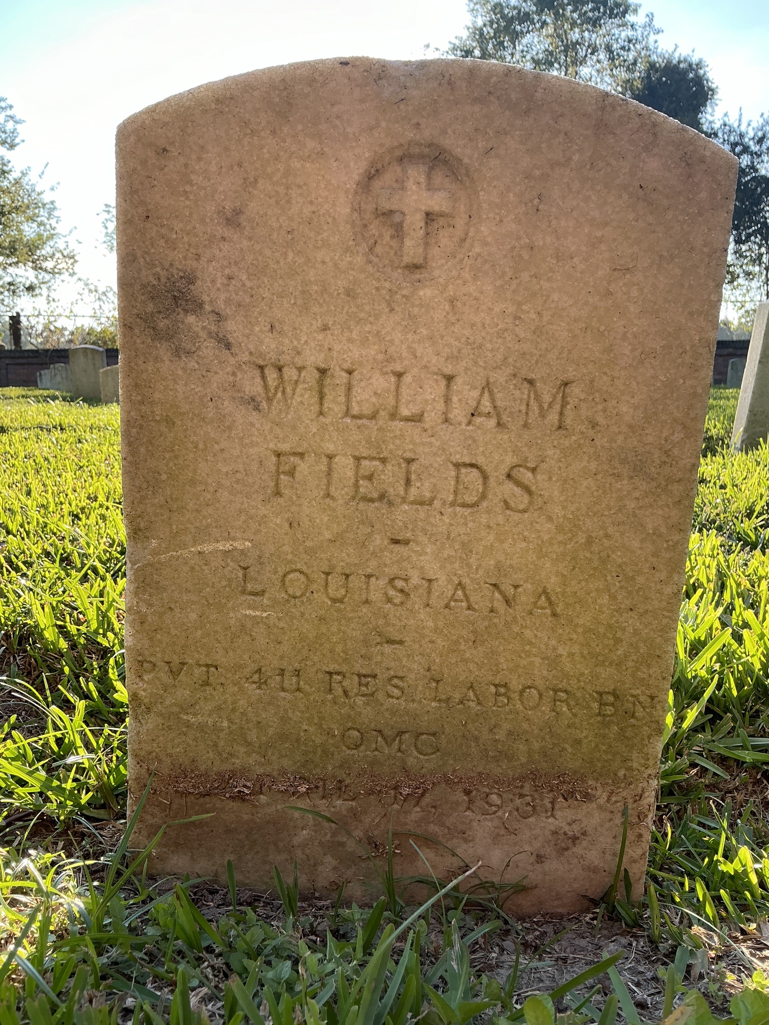 Front of upright marble headstone with flat face.