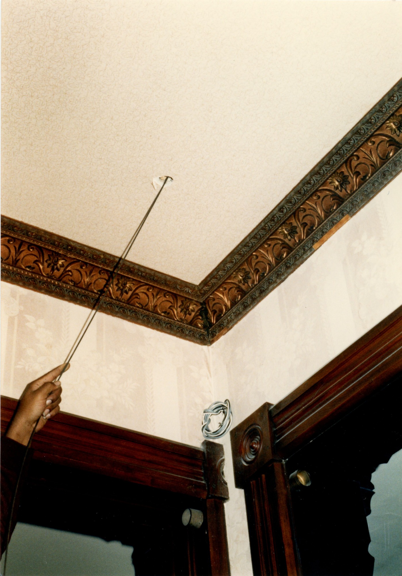Hole in ceiling of living room for smoke detector