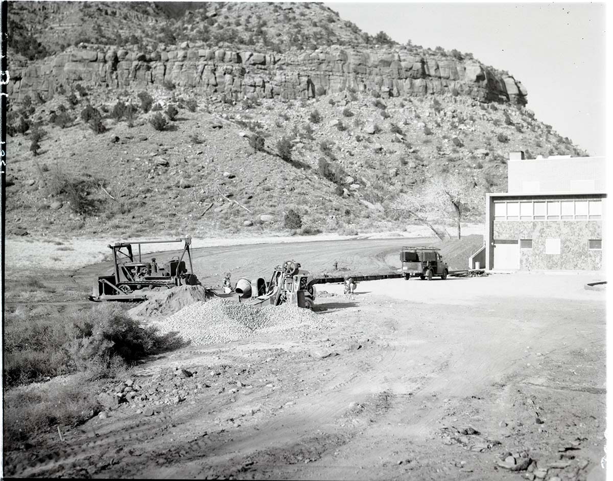 Parking area construction at rear of new Mission 66 Visitor Center and Museum for employee parking.