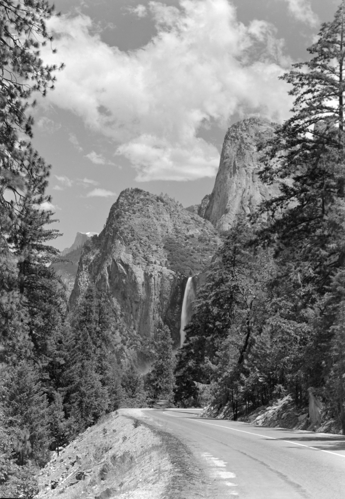Car on the Wawona Rd. with Bridalveil Fall.