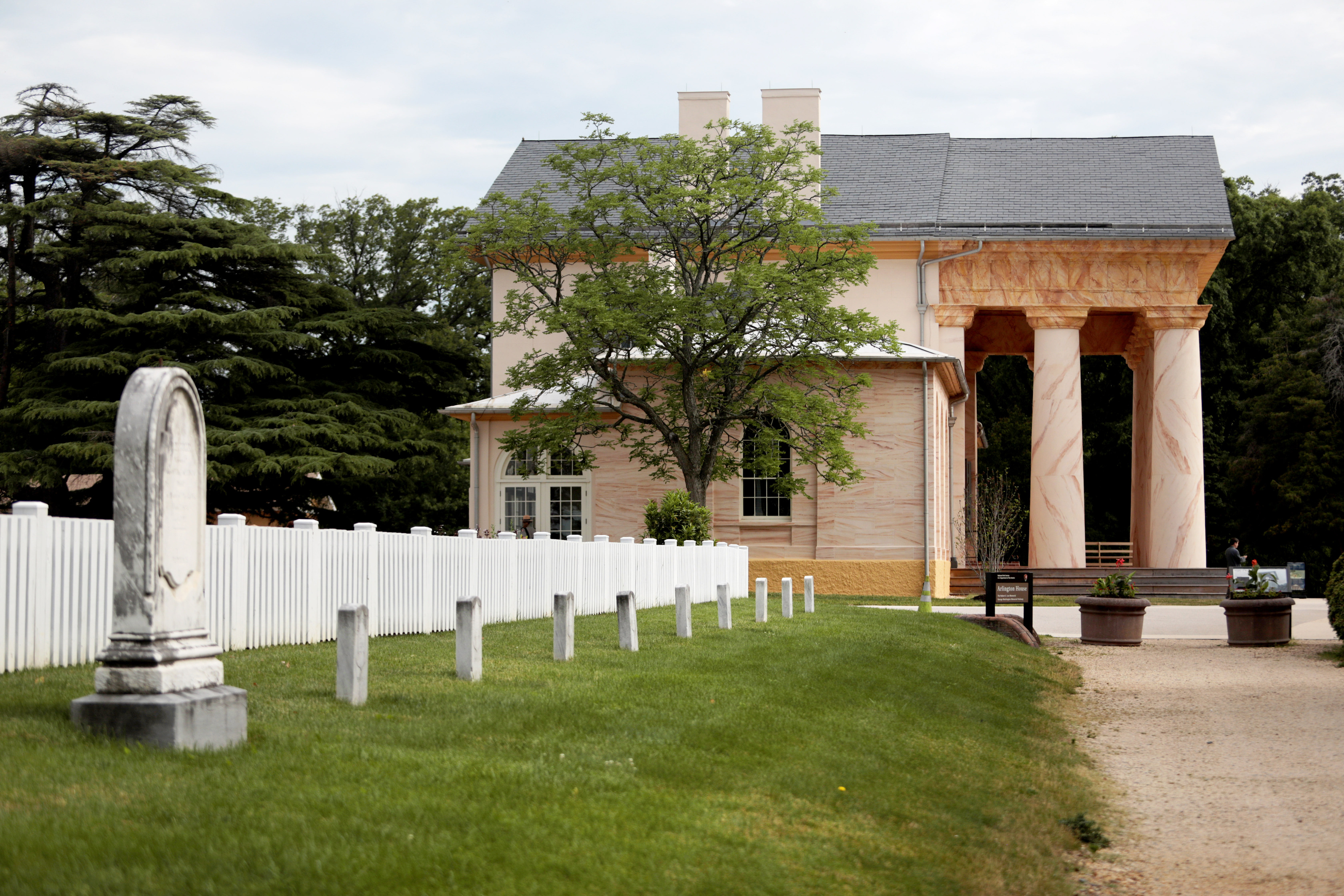 Graves and the exterior of the plantation house at Arlington House, The Robert E. Lee Memorial.  
