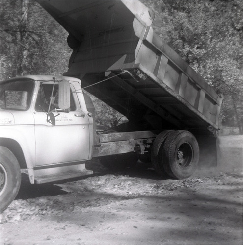 Truck dumping gravel for road construction near the Temple of Sinawava.