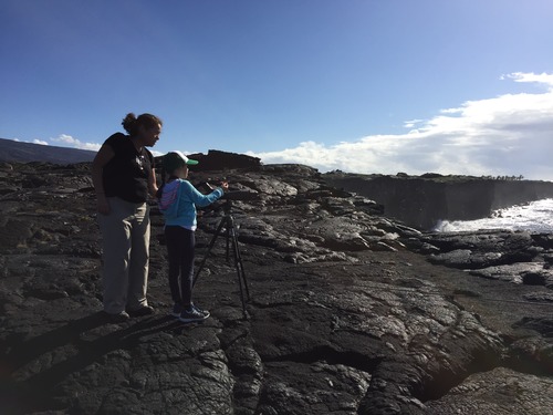 A 5th grader helps identify black noddies during the BioBlitz 2015 coastal bird inventory. 