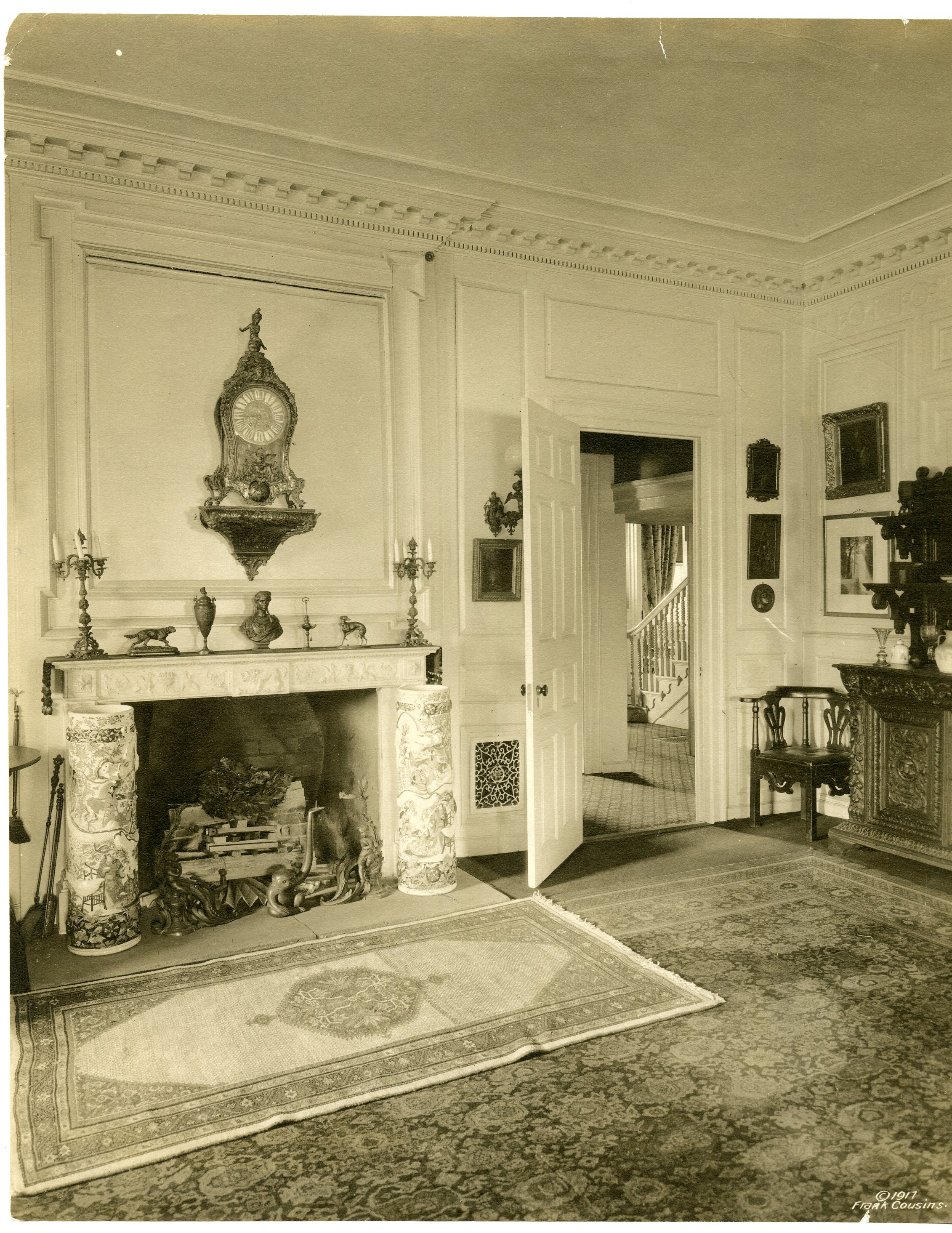 Black and white photograph of elaborately decorated 19th century library.