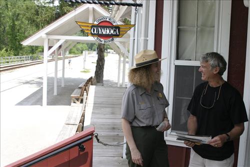 Ranger With Visitors Outside Peninsula Depot