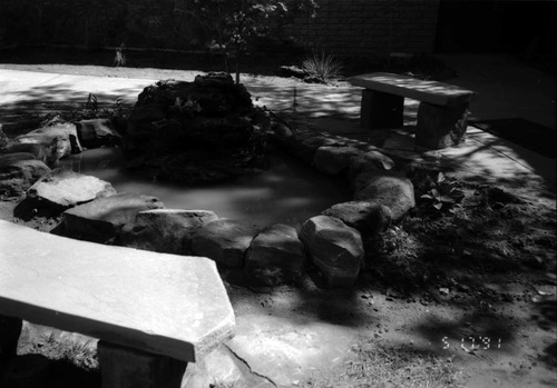 Water fixture in the courtyard are in headquarters during the construction of headquarters addition.