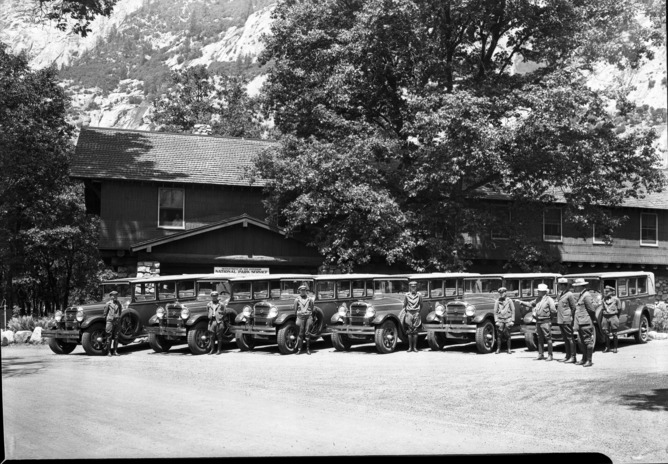 Copy Neg: Leroy Radanovich, December 2001. Auto stages with drivers in front of the NPS Administration Building.