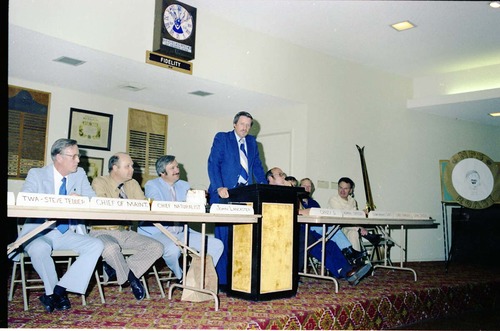 Color Photos of John Lancaster's farewell party at Elks Club in St. George, Utah. Speakers at roast in front of room: Pipe Spring National Monument Superintendent, TWA Steve Tedder, Chief of Maintenance, Chief Naturalist, John Lancaster, Crazy D, Administrative Officer, Cedar Breaks National Monument Superintendent, Chief Ranger, Unknown Skier.