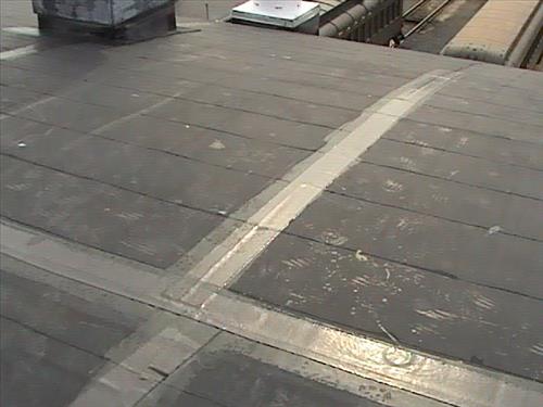 Temporary Repairs of Locomotive Shop Rubber Roof Summer 2009