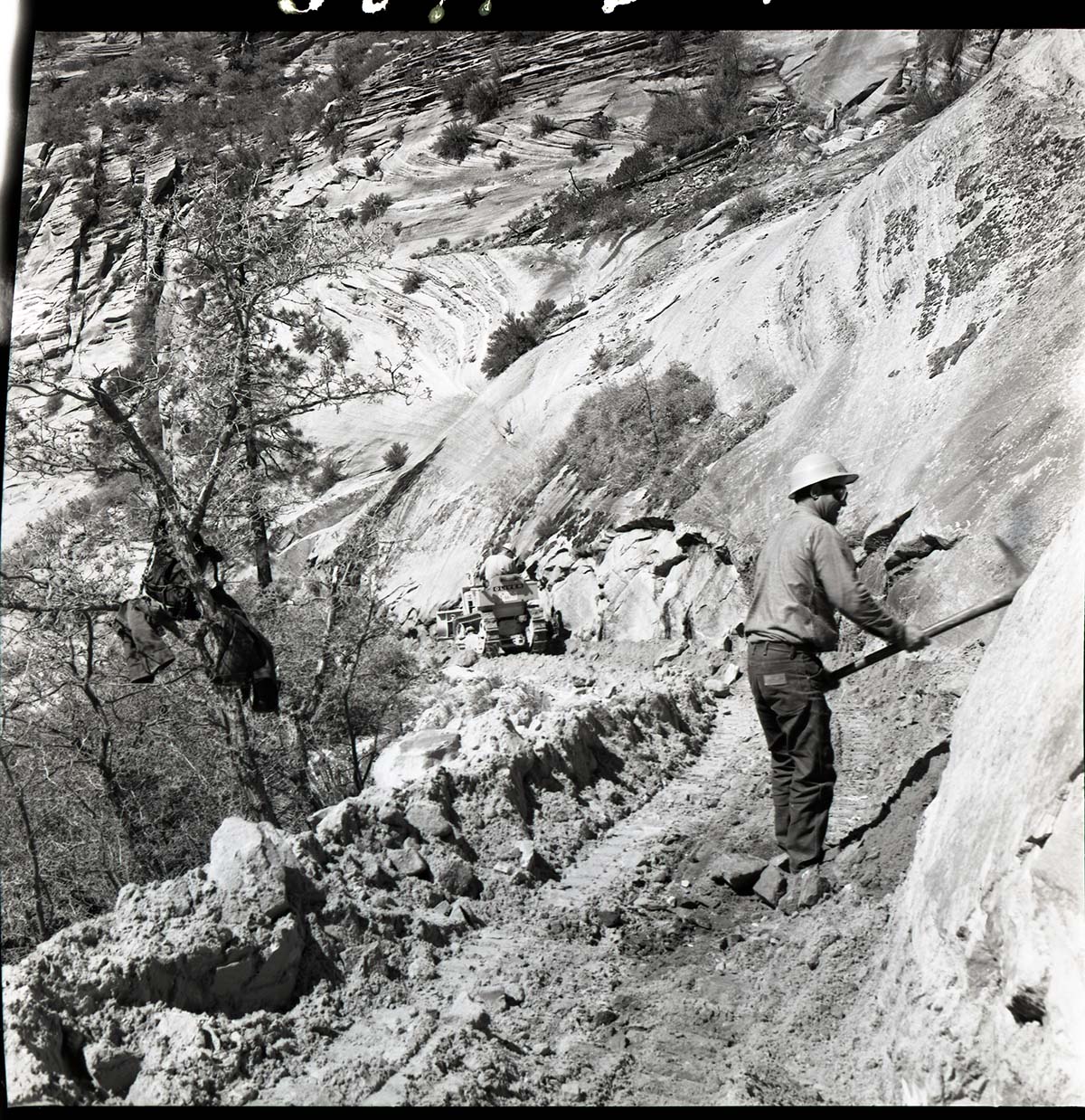 East Rim Trail reconstruction, worker on the trail.