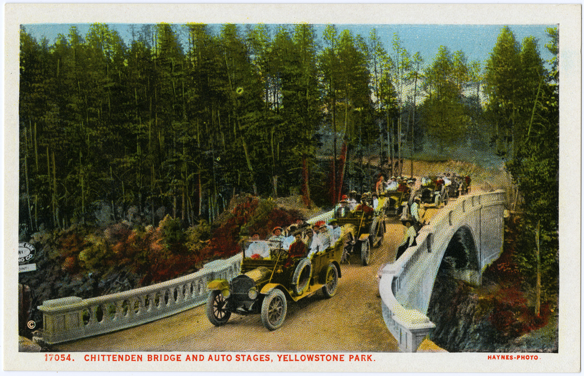 17054. Chittenden Bridge and Auto Stages, Yellowstone Park (Postcard)