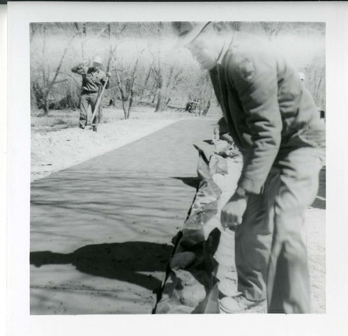 Workers during the Lady Mountain sign emplacement.