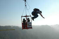 A BASE jumper leaves from the bridge