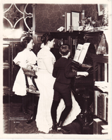 Mina Edison with 2 of her children, Madeleine Edison and Charles Edison at piano in Glenmont.