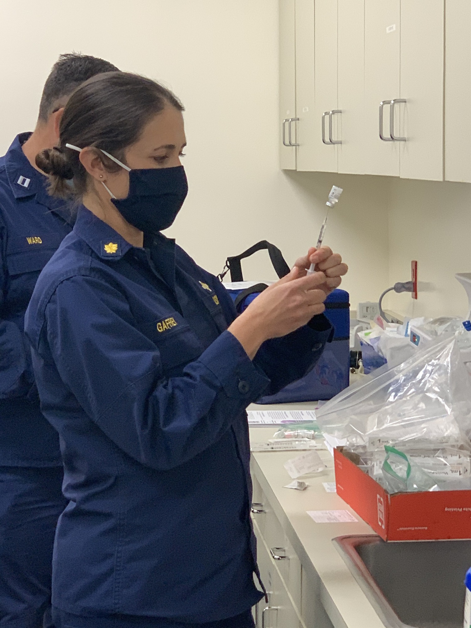 US Public Health Officers at Yosemite Medical Clinic Preparing first COVID-19 shots on Dec 17 2020