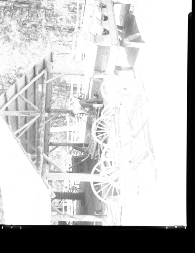 Columbia running gear-Washburn body. Ed. Whittmore in background.