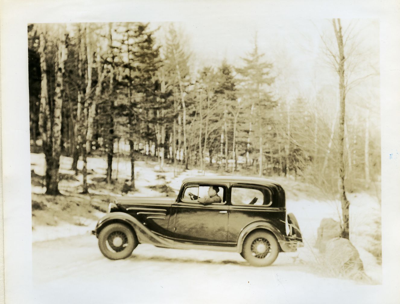 SULLIVAN'S CAR CROSS-WISE OF ROAD UP CADILLAC