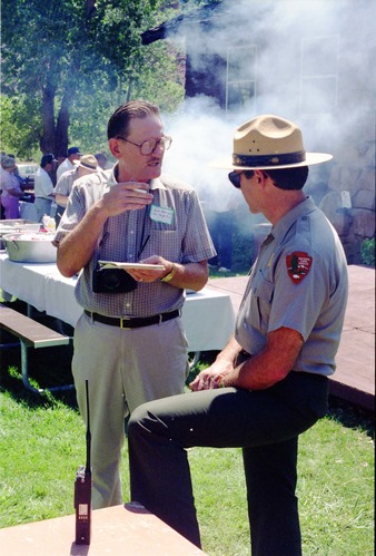 Color Photos of the parks 72nd anniversary celebrations- cake cutting, barbecue, speakers.