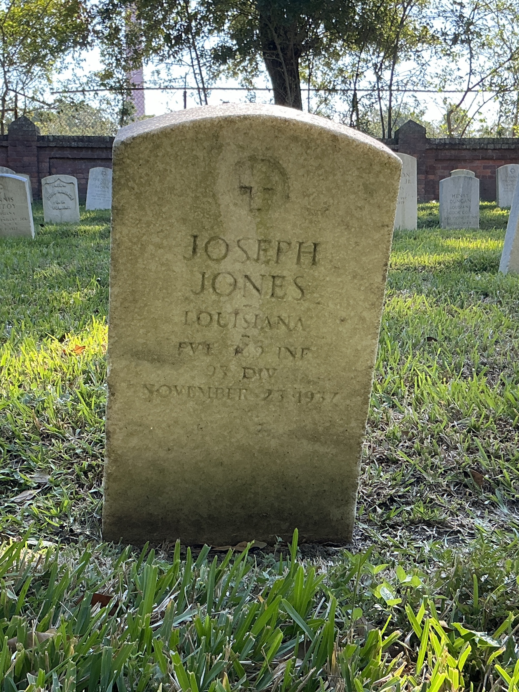 Front of upright marble headstone with flat face.