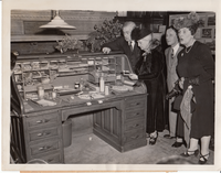 Charles Edison, Mina Edison, Harvey Firestone, Jr., and Madeleine Edison Sloane at opening of Edison's desk in Library of Building 5.