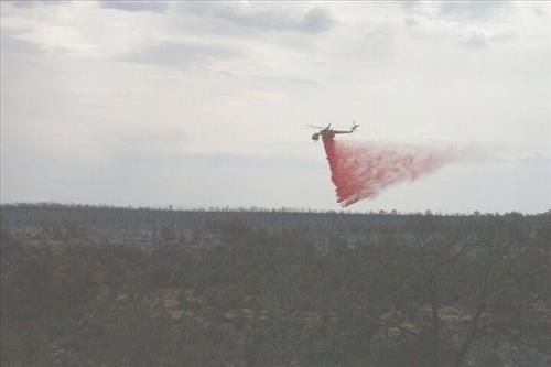 Helicopter involved in fire retardant operations, Long Mesa Fire, Mesa Verde National Park, July-August 2002