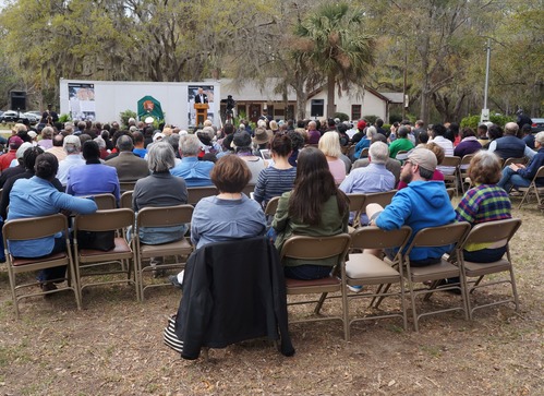 Attendees watch the dedication program at Reconstruction Era National Monument on March 18, 2017.