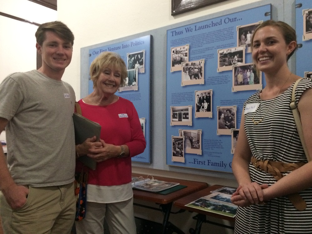 Plains High School alumni and guests view the exhibits in the hallway at Plains High School.