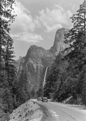 Cars on Wawona Rd. with Bridalveil Fall.