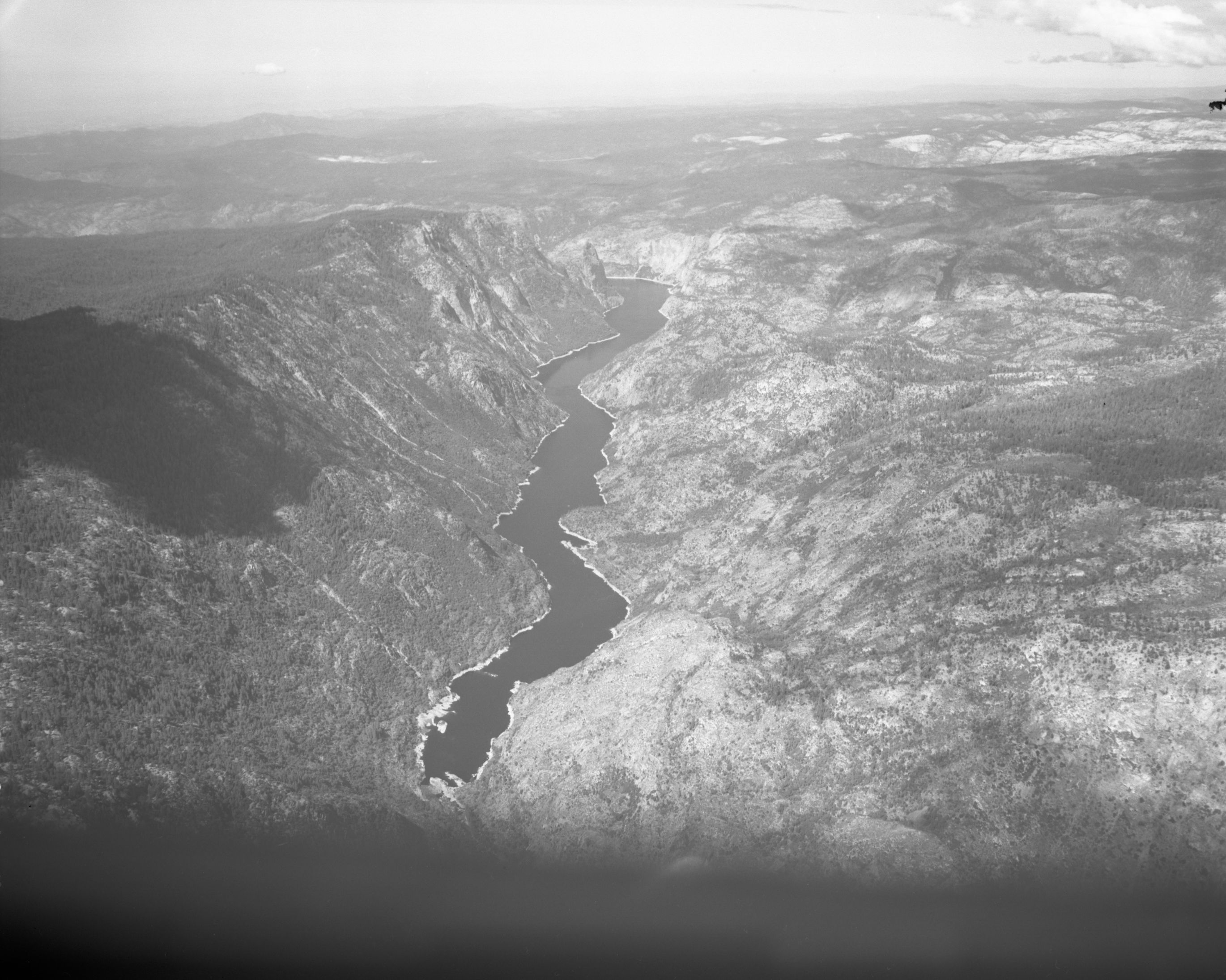 Aerial photograph of Hetch Hetchy Reservoir from flight over park.