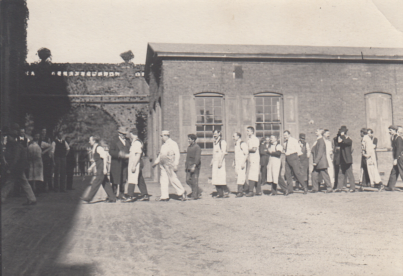Thomas Edison being greeted by lab employees upon his return from Europe.
