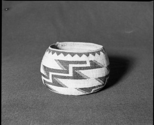 Marie Rozier Collection, Catalog No. 92. Object: Yurok/Karok/Hupa basket. Dimensions: 8 x 5". Materials: Conifer root, maidenhair fern stems, beargrass. Collection History: Alice Reade Collection. Photographed by Michael Dixon in December 1982. Catalogued by Craig Bates and Barbara Beroza. Yosemite Collections, National Park Service.