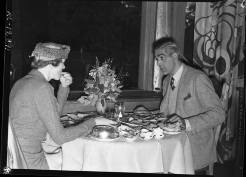 Boris Karloff and unidentified woman (possibly Dorothy Stine, whom he was married to from 1928-1946) dining at The Ahwahnee. See also RL-19,889, RL-19,890 and RL-19,892.